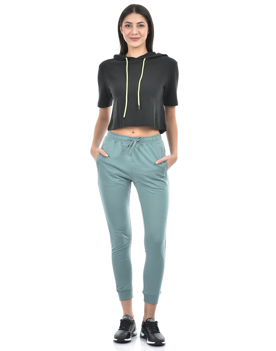 Numero Uno Women Solid Green Track Pants